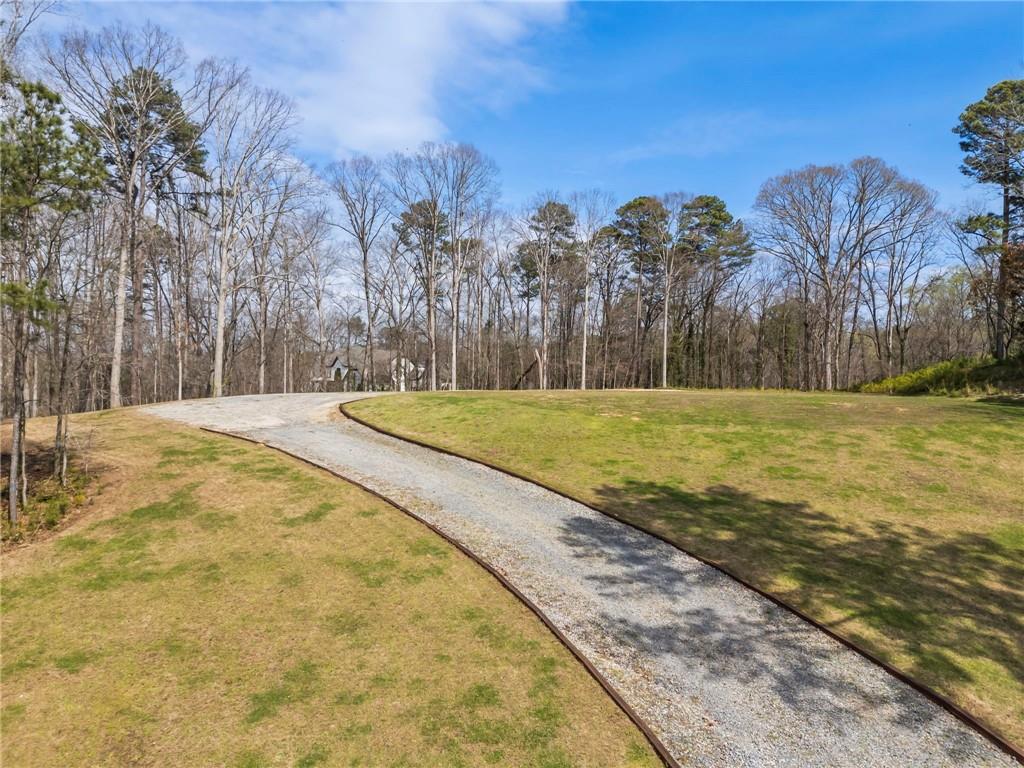 4931 Rebel Trail Atlanta, GA 30327 - Photo 29 of 30 a view of swimming pool with a yard