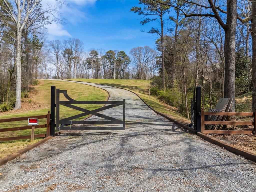 4931 Rebel Trail Atlanta, GA 30327 - Photo 3 of 30 a view of a park with iron fence