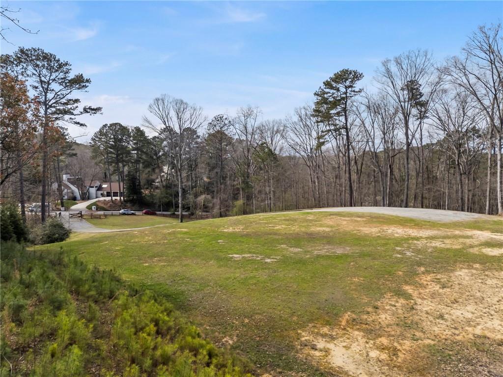 4931 Rebel Trail Atlanta, GA 30327 - Photo 9 of 30 a view of swimming pool with trees