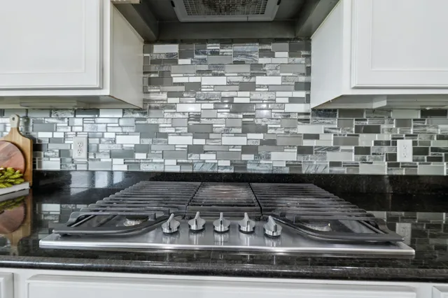 a bathroom with a sink and mirror
