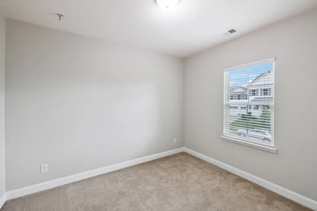 a view of a hallway with elevator