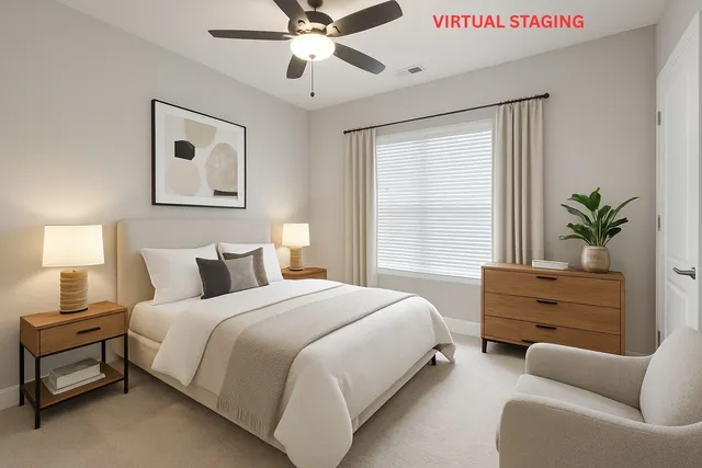 a bedroom with a bed and window