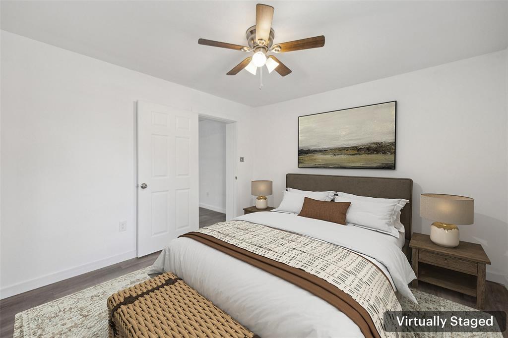 3847 Stalcup Road Fort Worth, TX 76119 - Photo 17 of 30 a bedroom with a bed and window