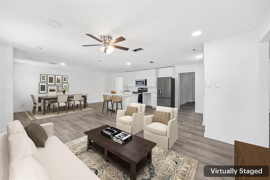 3847 Stalcup Road Fort Worth, TX 76119 - Photo 5 of 30 a living room with furniture and kitchen view