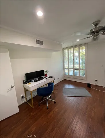 a workspace with wooden floor