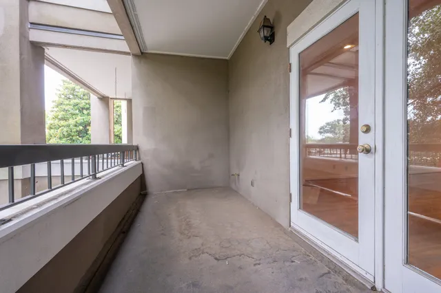 a view of a room with a large window