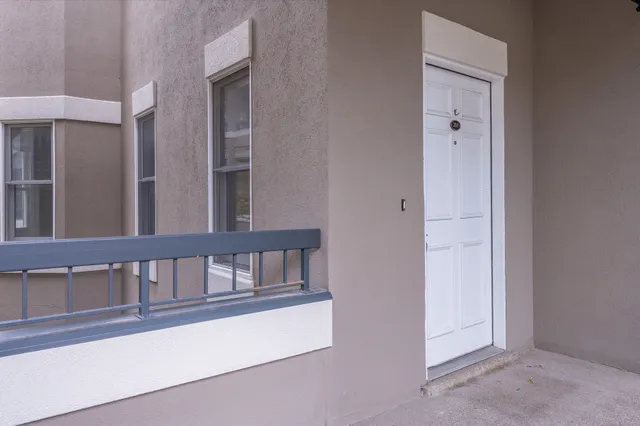 a view of parking garage with lots of space