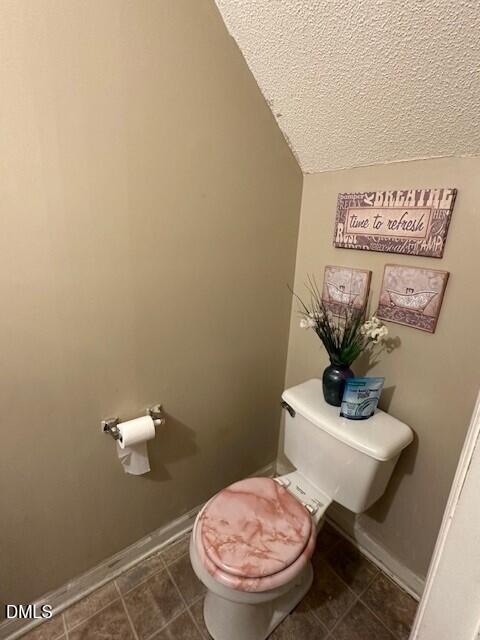 4801 Tanglewood Oaks Street Raleigh, NC 27610 - Photo 6 of 12 a bathroom with a toilet and a sink