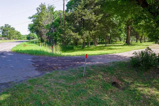 a view of outdoor space with deck and yard