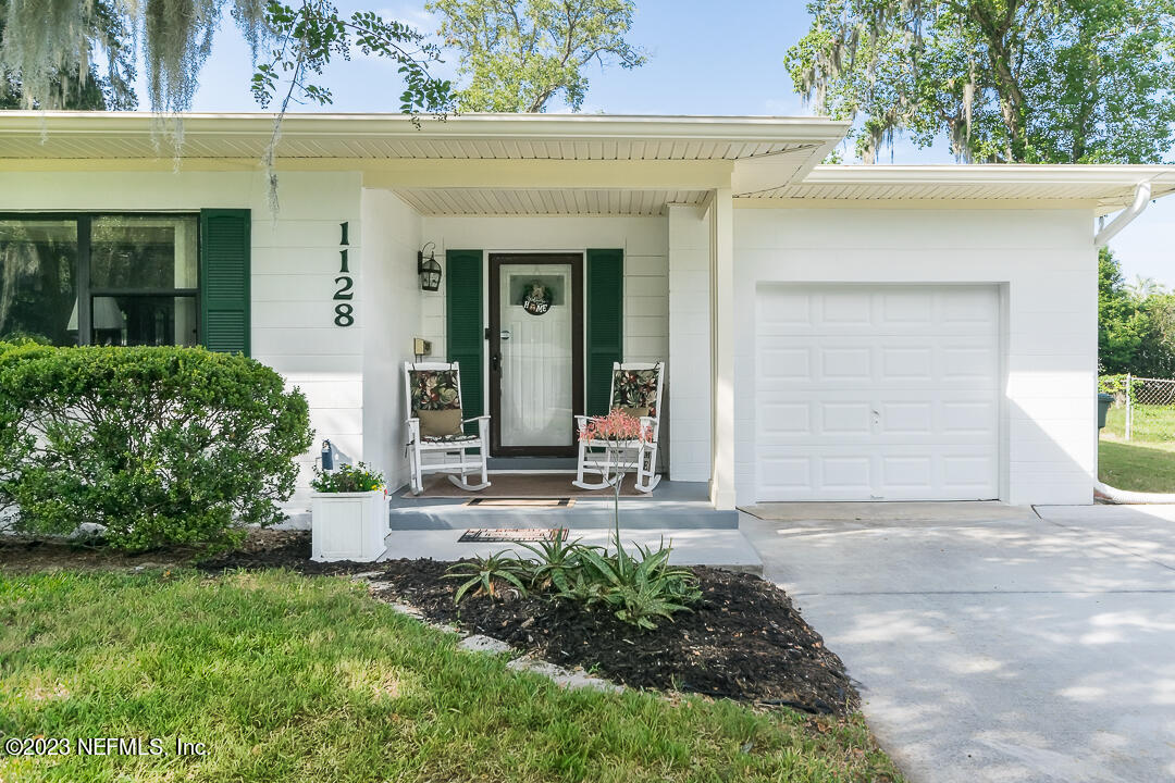 1128 Nightingale Road Jacksonville, FL 32216 - Photo 3 of 18 front porch/garage
