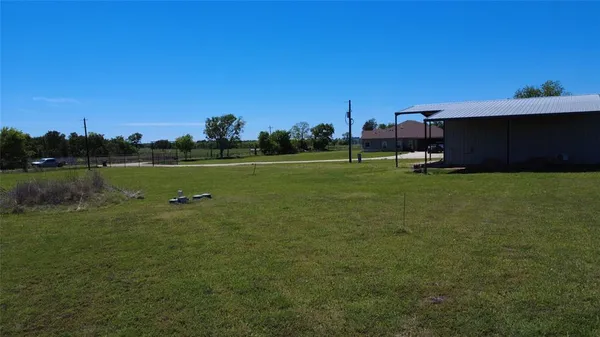 a view of a golf course with a lake