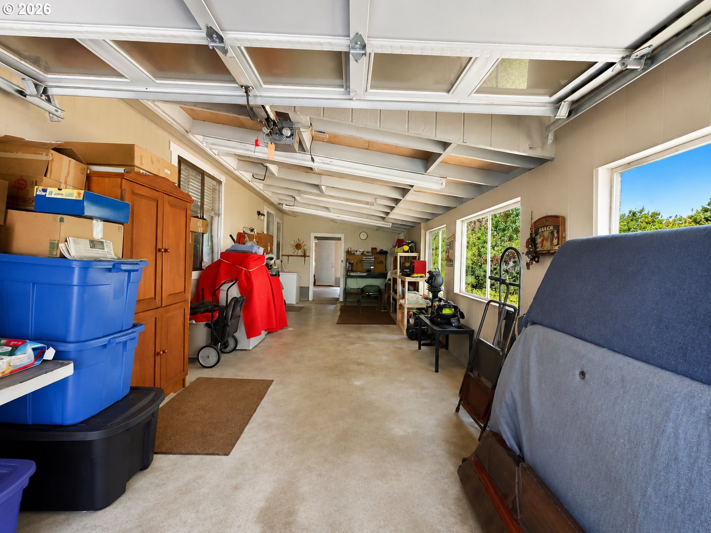 16219 Lower Harbor Road, Unit 16 Brookings, OR 97415 - Photo 31 of 40 a view of a garage with storage