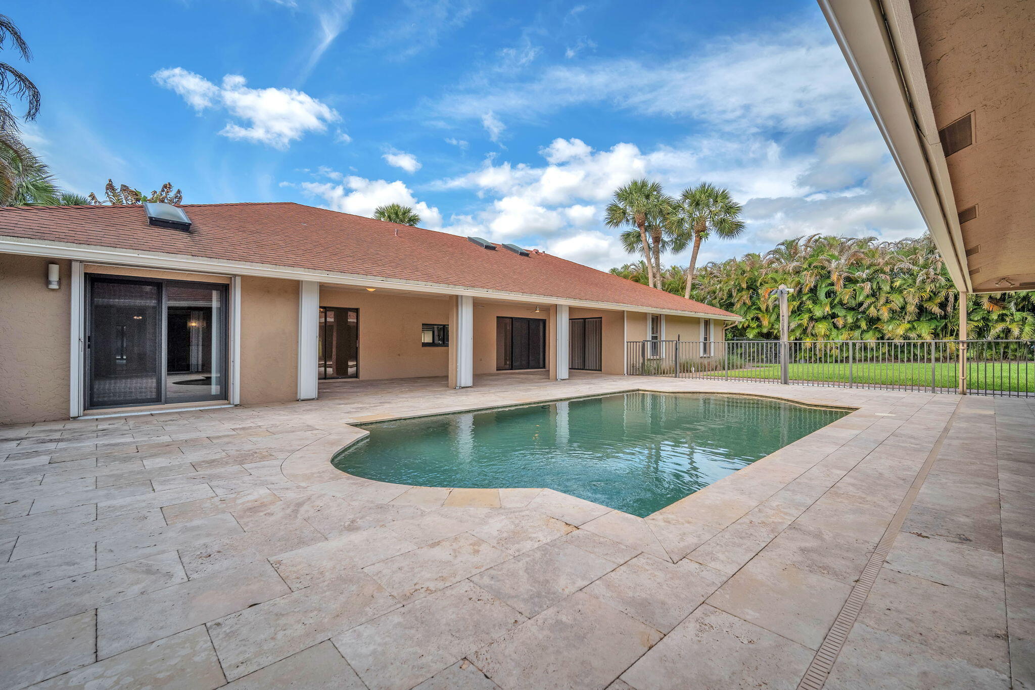 13759 Doubletree Trail Wellington, FL 33414 - Photo 17 of 76 a view of a house with a swimming pool