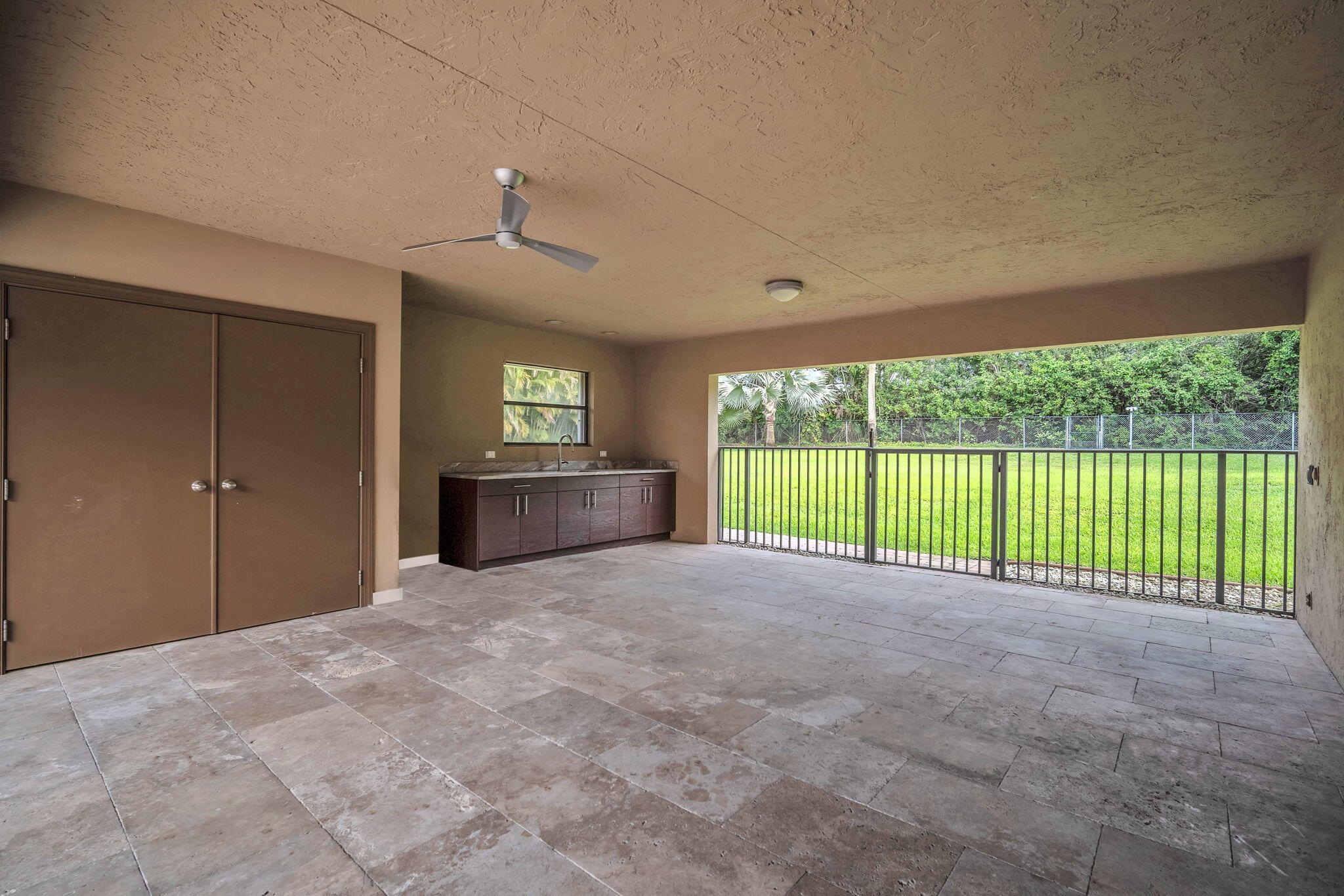 13759 Doubletree Trail Wellington, FL 33414 - Photo 20 of 76 a view of an empty room with a balcony