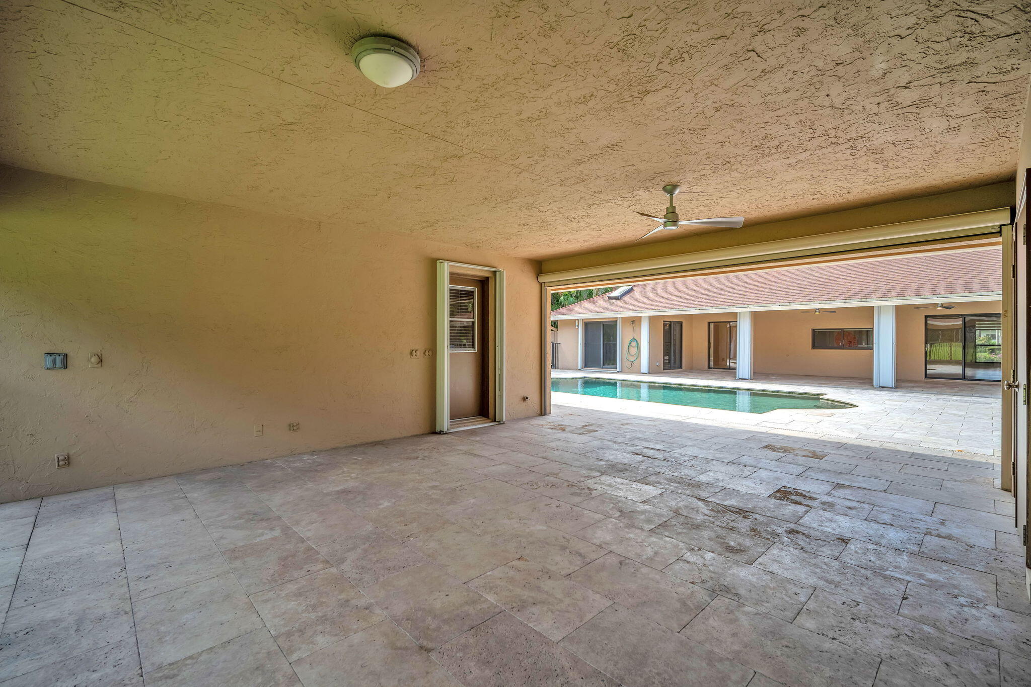 13759 Doubletree Trail Wellington, FL 33414 - Photo 22 of 76 a view of a house with a empty space and a window