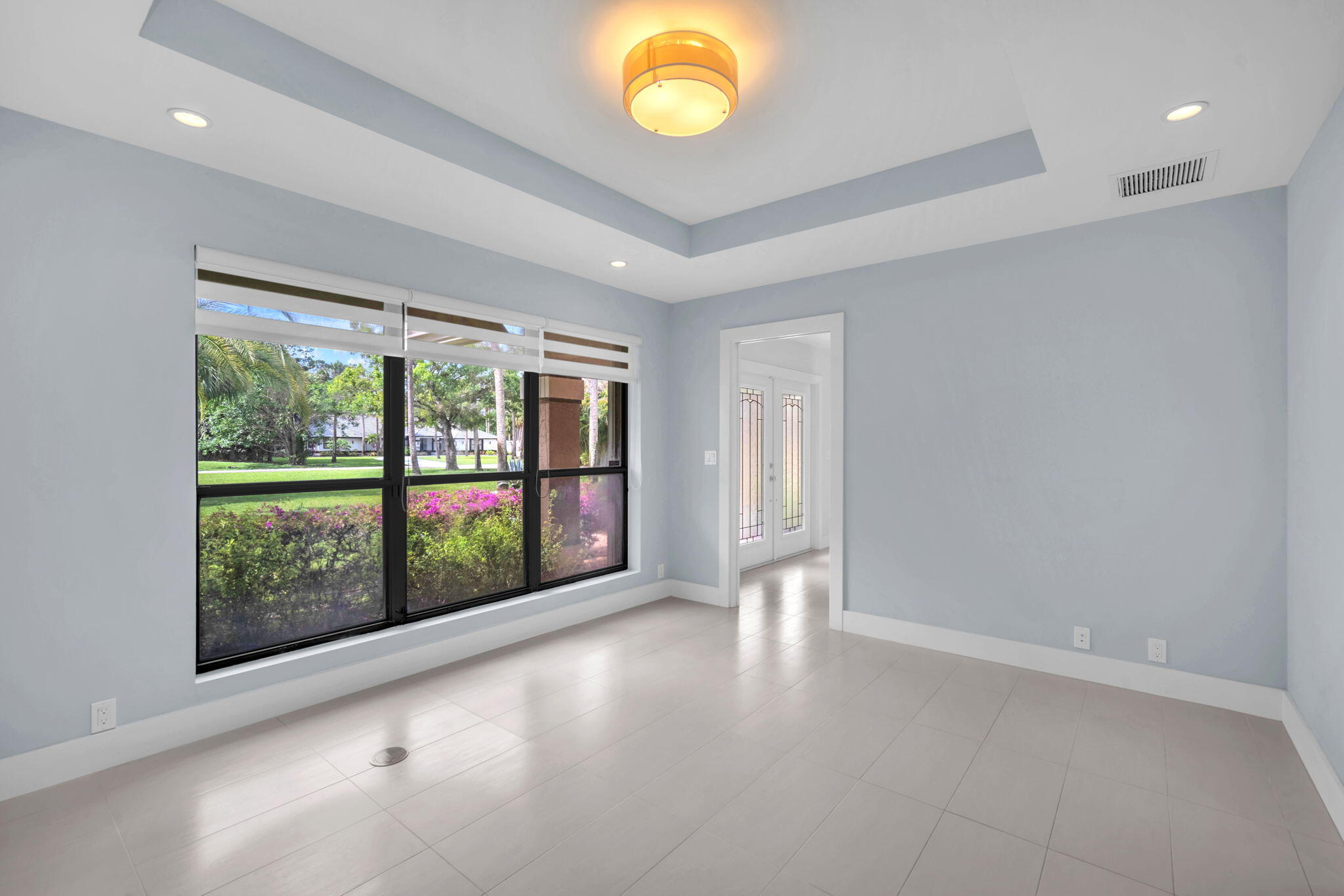 13759 Doubletree Trail Wellington, FL 33414 - Photo 43 of 76 a view of an empty room with a window and doors