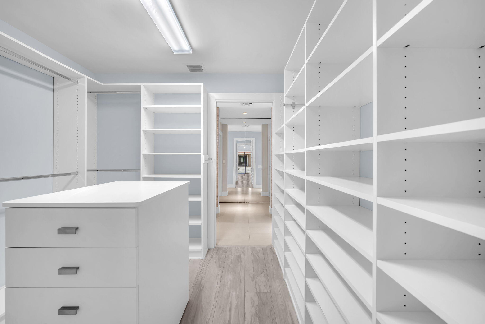 13759 Doubletree Trail Wellington, FL 33414 - Photo 57 of 76 a view of an empty walk in closet