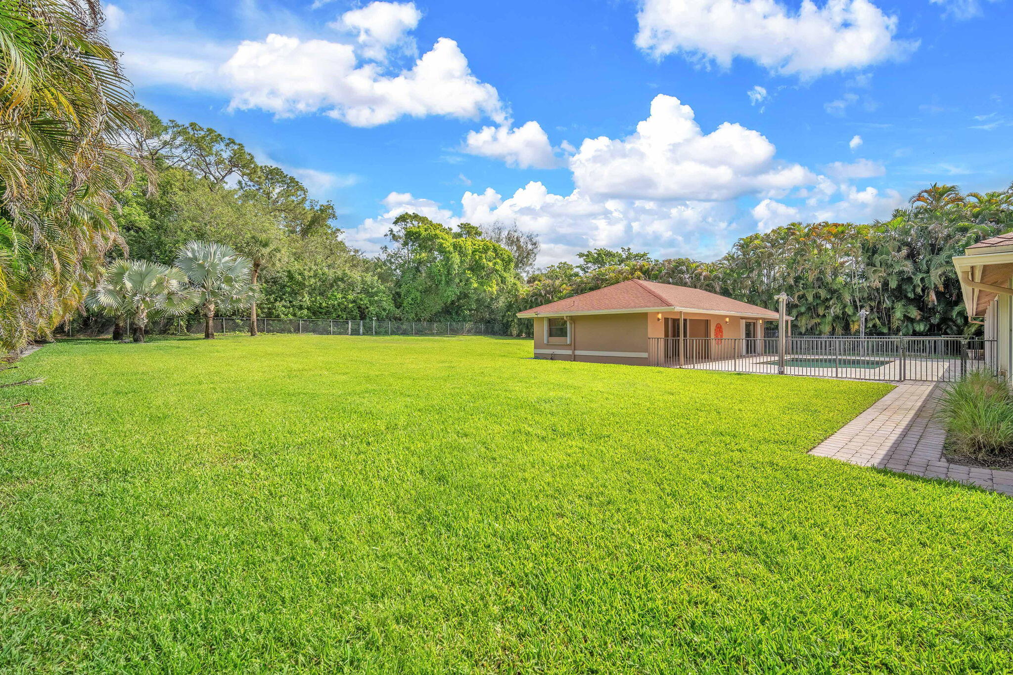 13759 Doubletree Trail Wellington, FL 33414 - Photo 6 of 76 a view of a house with a yard