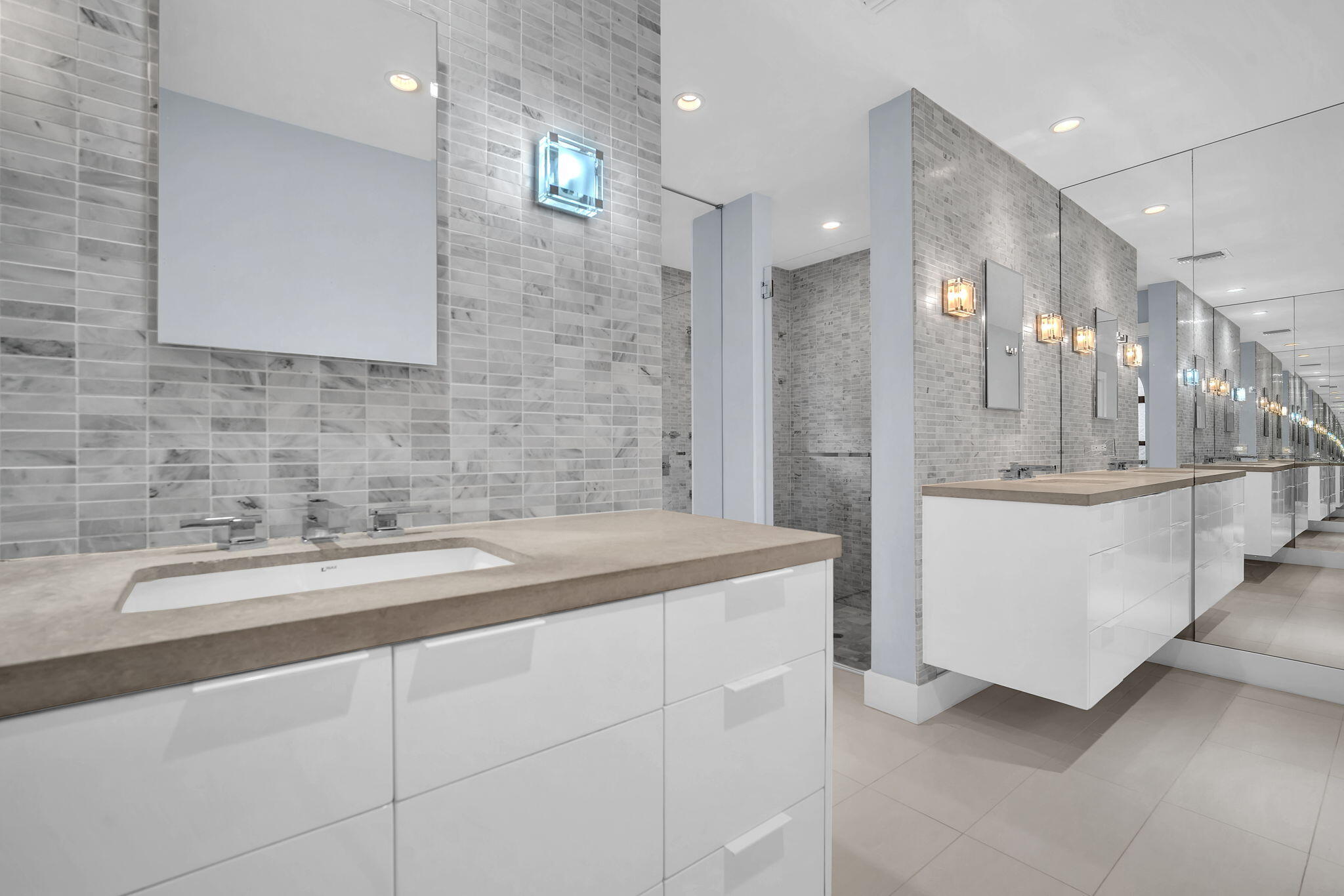 13759 Doubletree Trail Wellington, FL 33414 - Photo 63 of 76 a bathroom with a sink a vanity a mirror and a bathtub