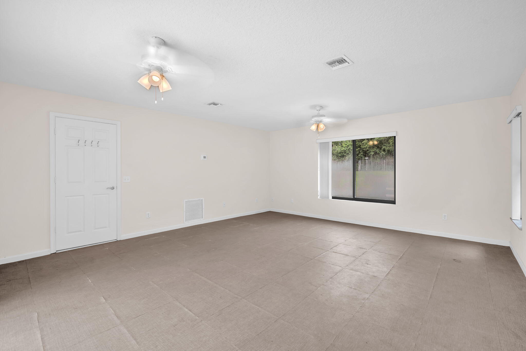 13759 Doubletree Trail Wellington, FL 33414 - Photo 72 of 76 an empty room with a empty space and a window