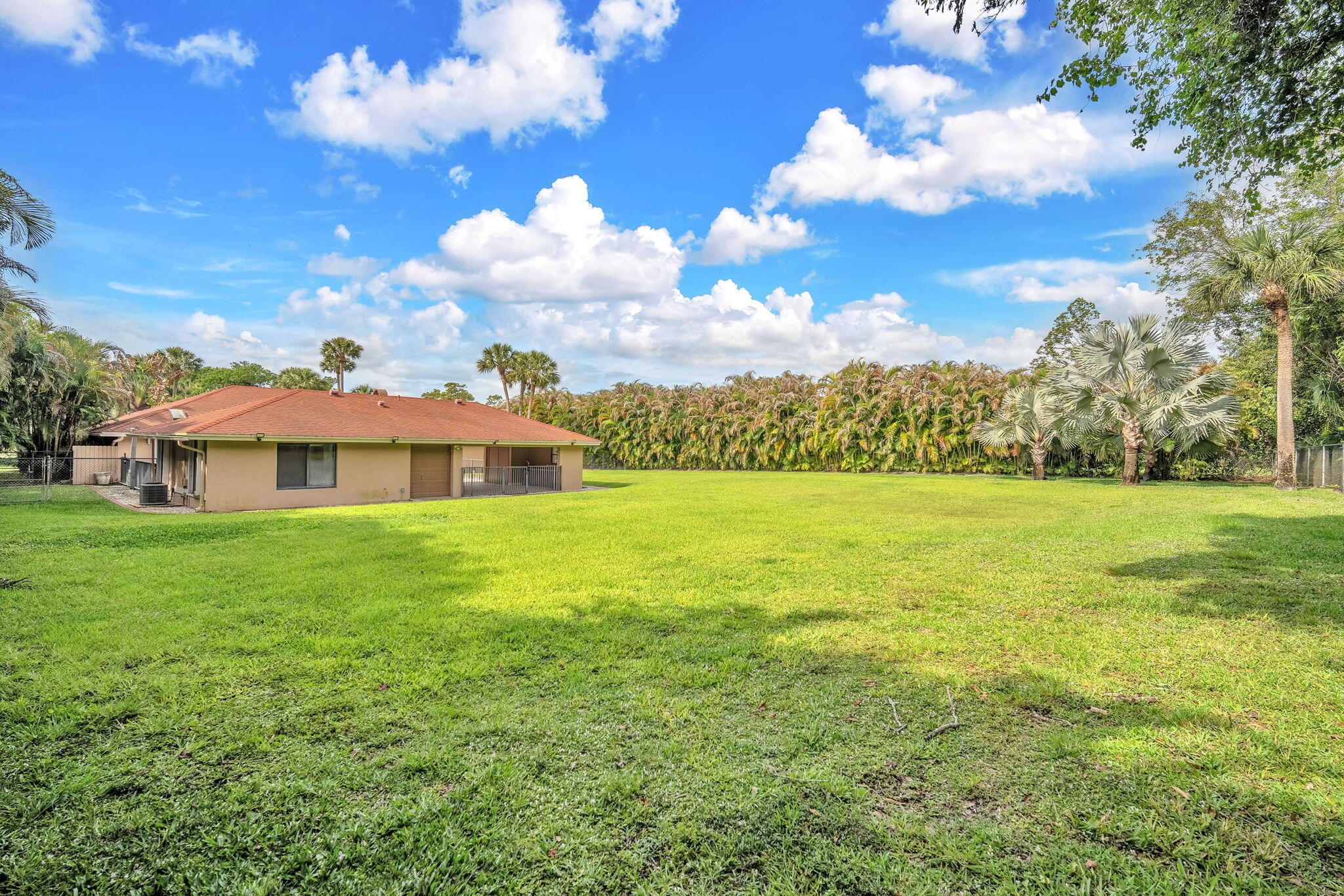 13759 Doubletree Trail Wellington, FL 33414 - Photo 10 of 76 a view of a house with a yard