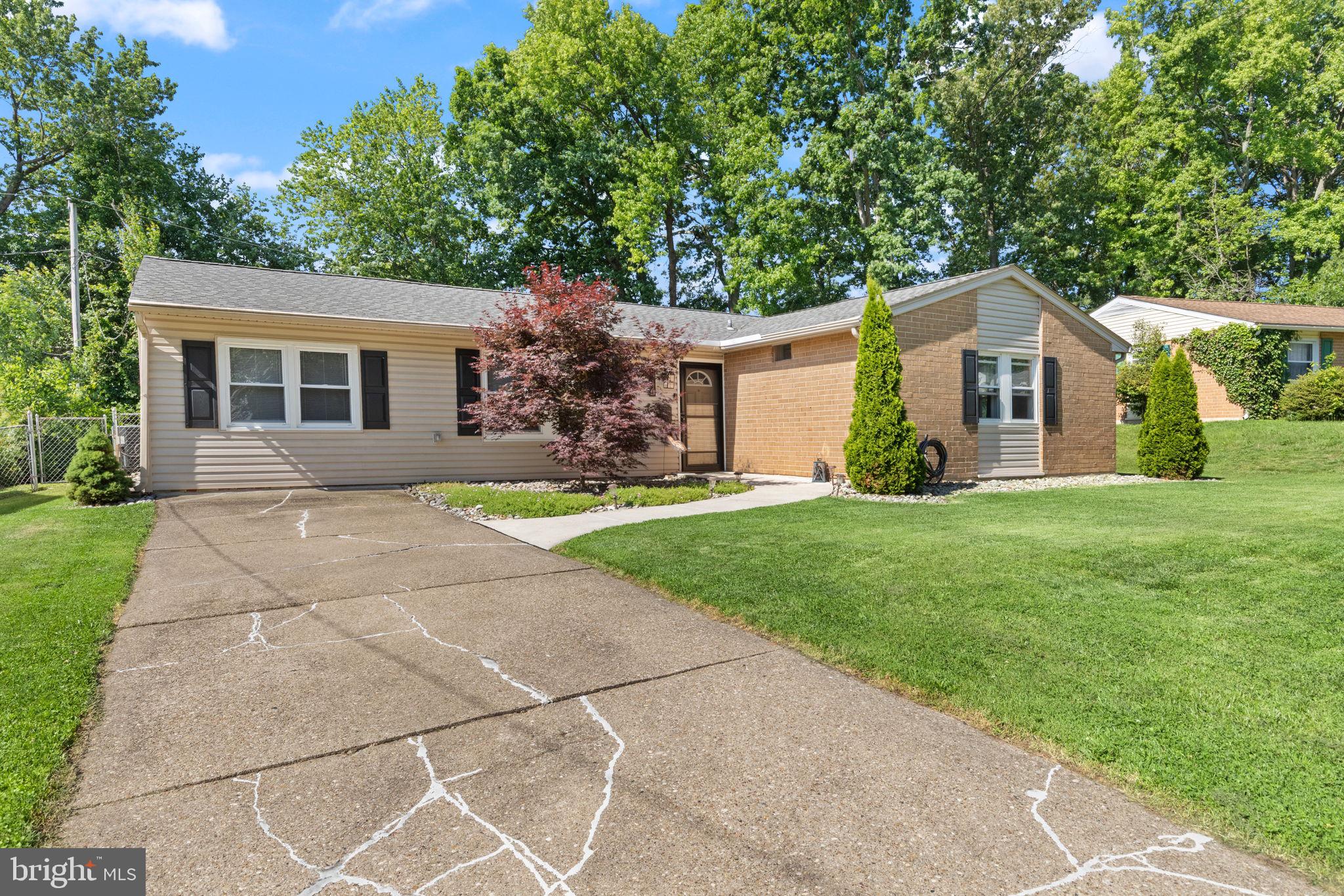 814 Foxwell Road Joppa, MD 21085 - Photo 2 of 21 a front view of house with yard and green space