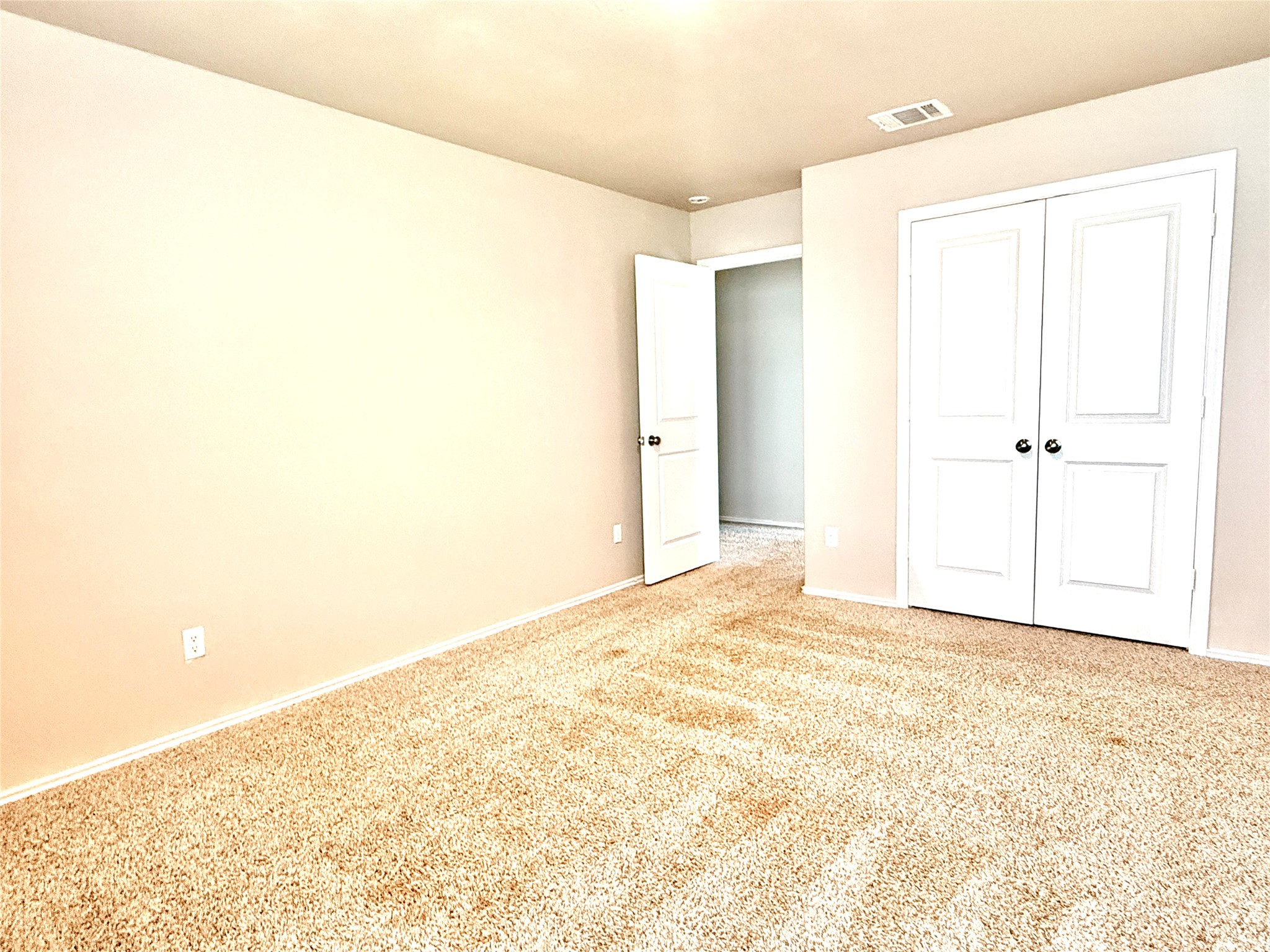 129 Perfect World Loop Jarrell, TX 76537 - Photo 27 of 31 A quiet retreat with fresh carpet offers a blank canvas for personalization and comfort.