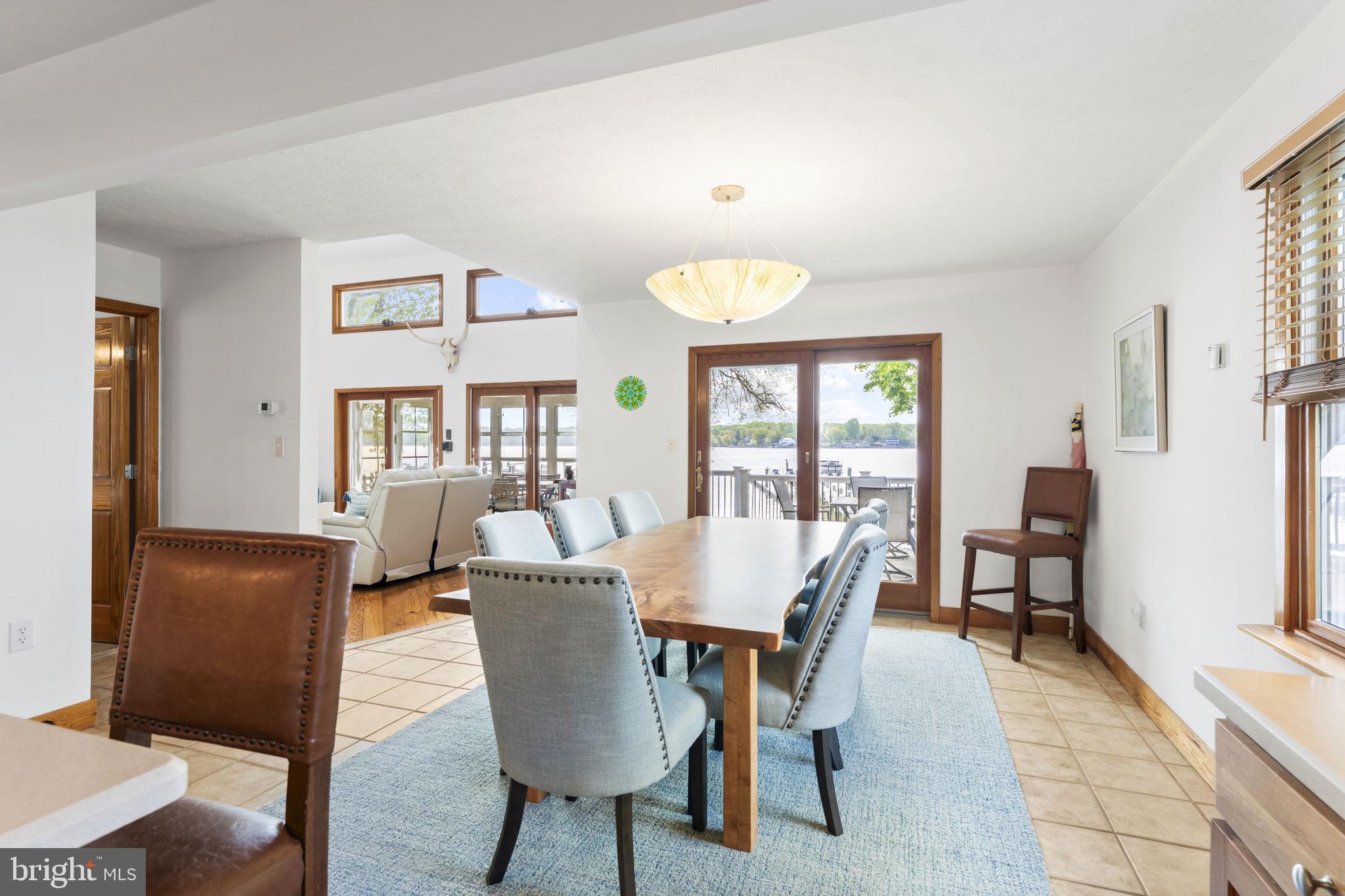 94 Crescent Lane Elkton, MD 21921 - Photo 14 of 59 a view of a dining room with furniture window and wooden floor