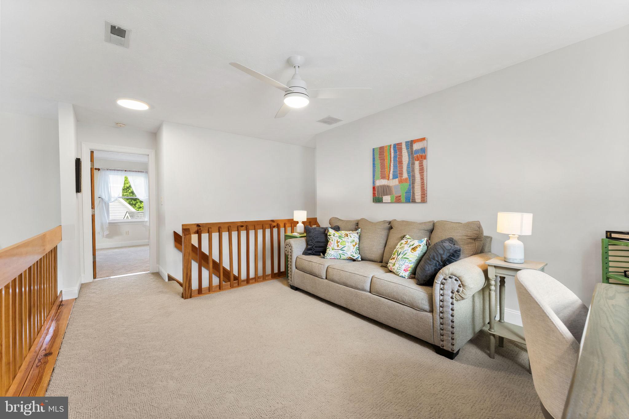 94 Crescent Lane Elkton, MD 21921 - Photo 28 of 59 a spacious bedroom with a bed window and couch