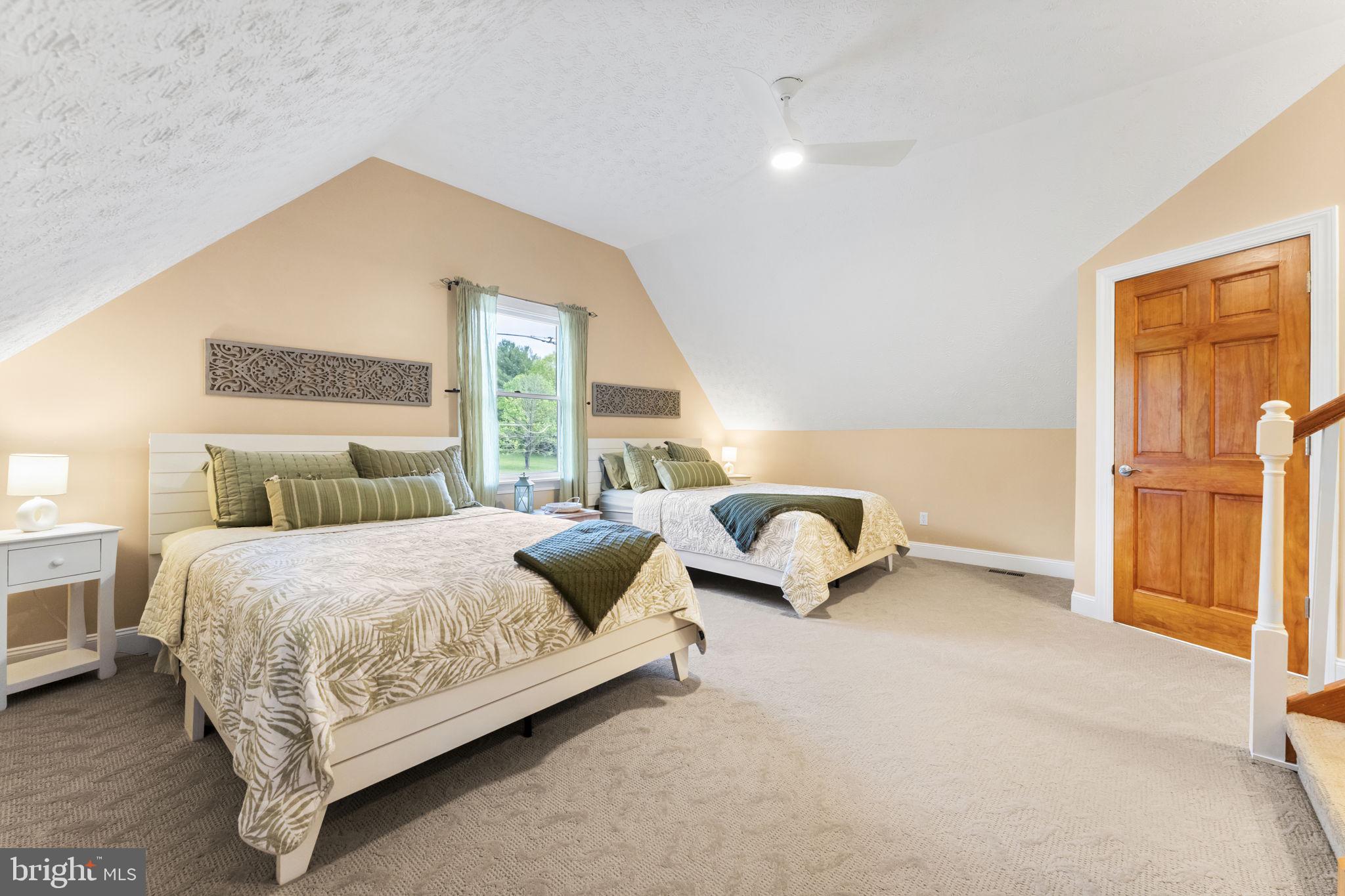 94 Crescent Lane Elkton, MD 21921 - Photo 39 of 59 a bedroom with a bed and a cabinets