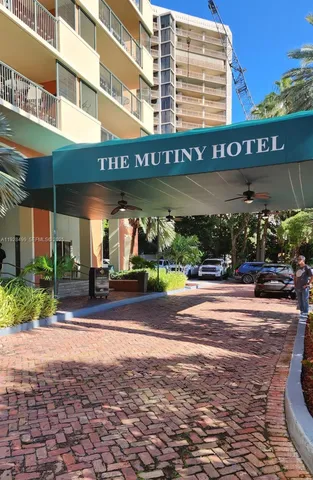 a view of a building and a yard