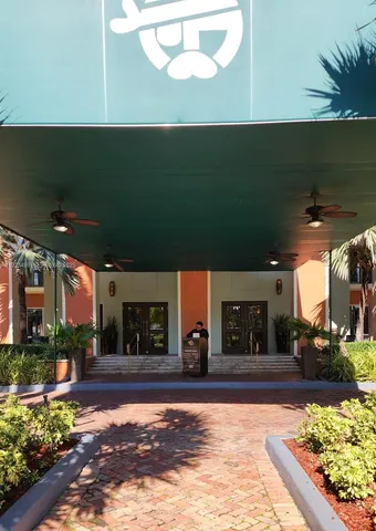 a view of lobby with furniture and potted plants