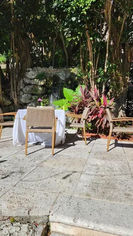 a view of swimming pool with outdoor seating