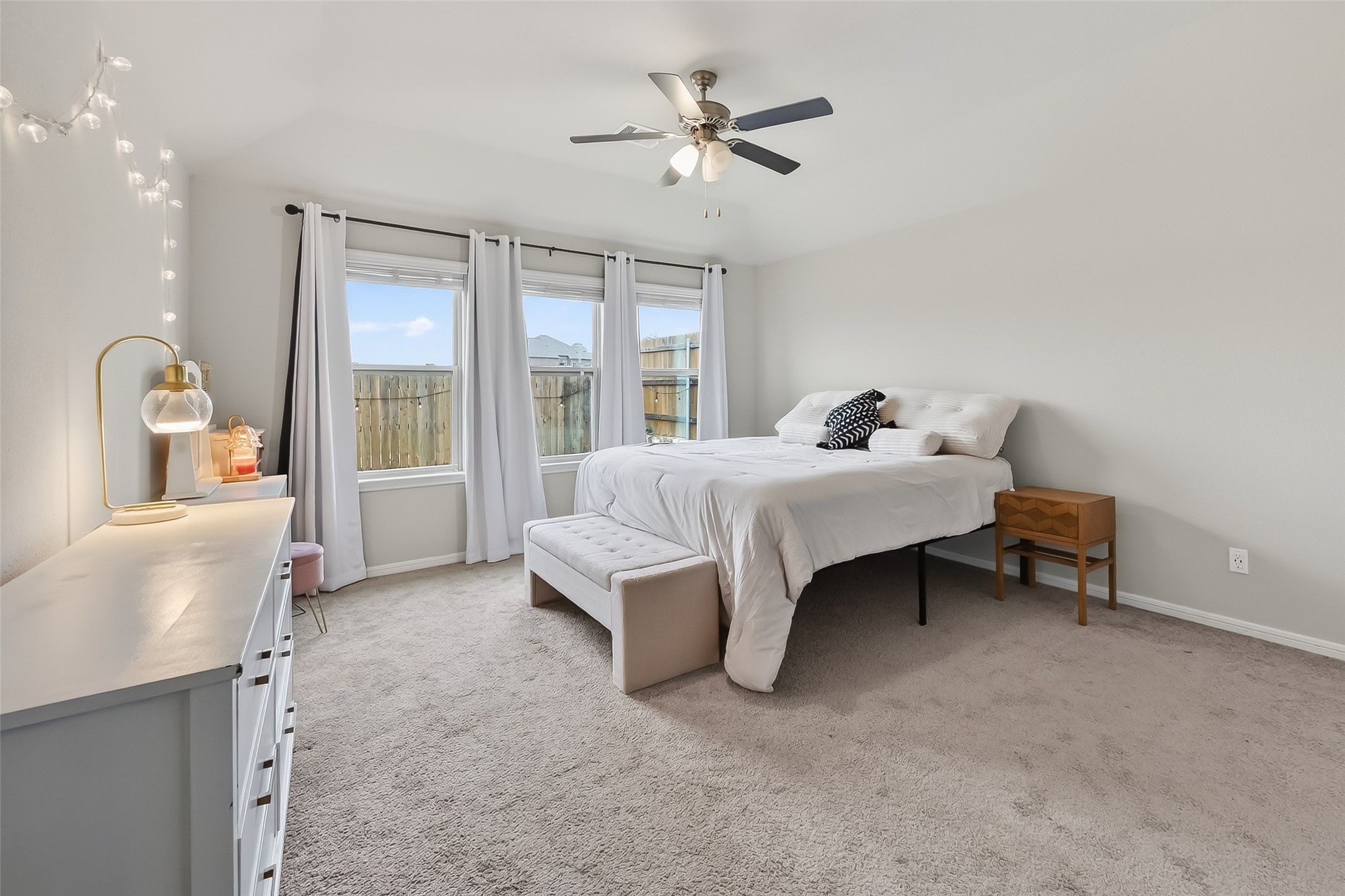 689 Red Elm Lane Conroe, TX 77304 - Photo 15 of 37 a bedroom with furniture and window