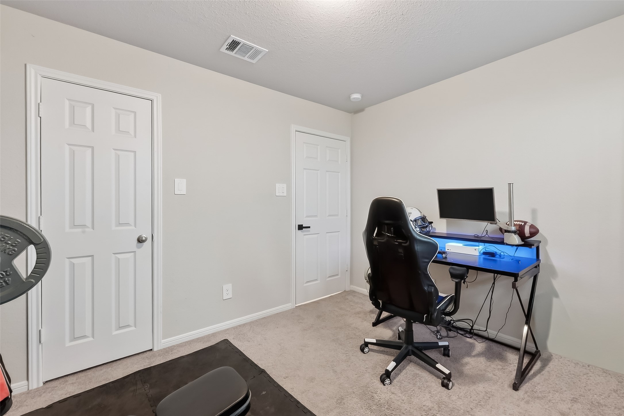689 Red Elm Lane Conroe, TX 77304 - Photo 20 of 37 a view of a workspace with furniture and a window