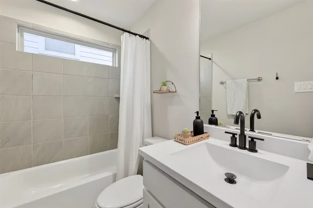 a bathroom with a sink and a tub