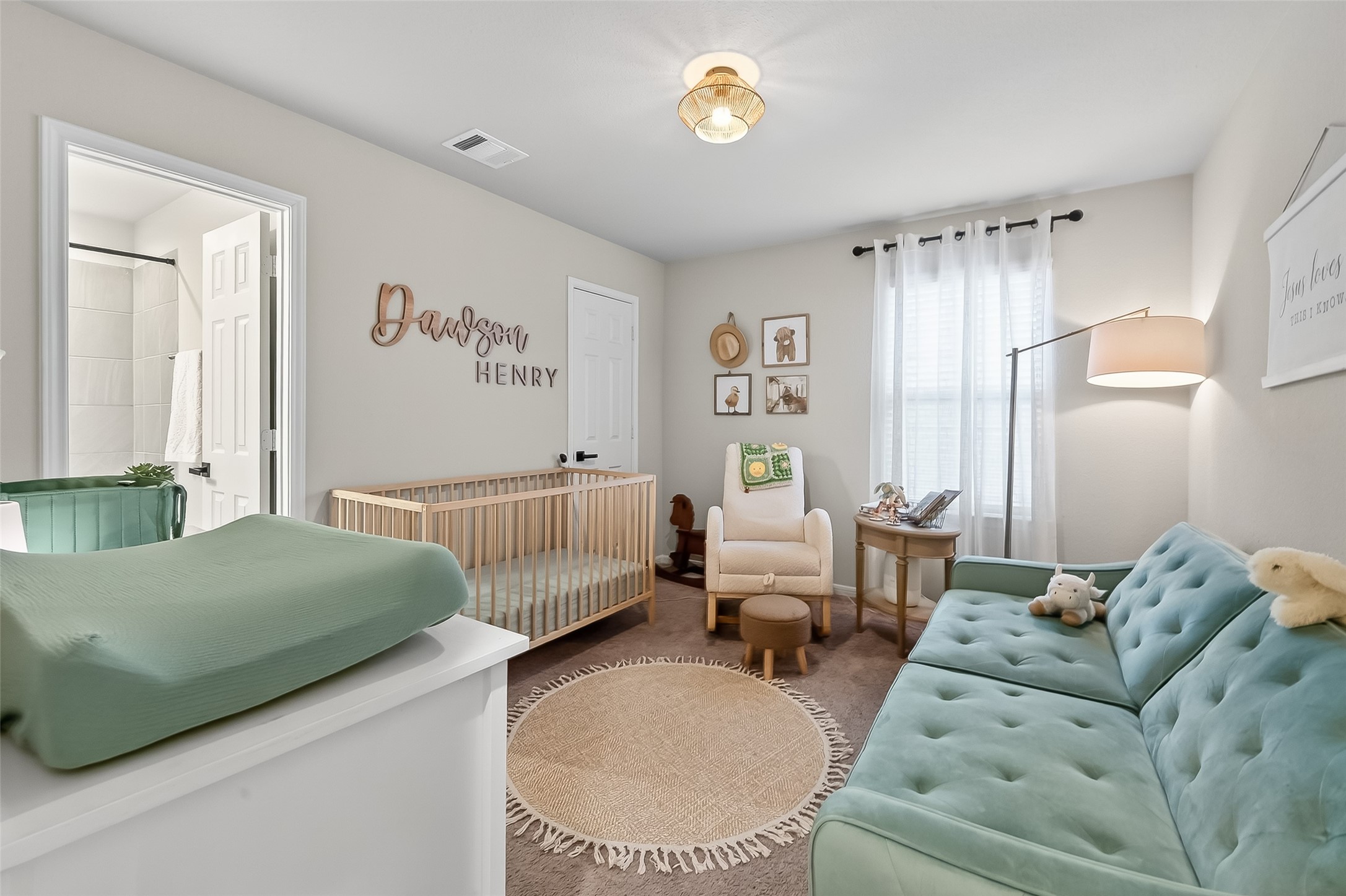 689 Red Elm Lane Conroe, TX 77304 - Photo 24 of 37 a bedroom with a bed and wooden floor