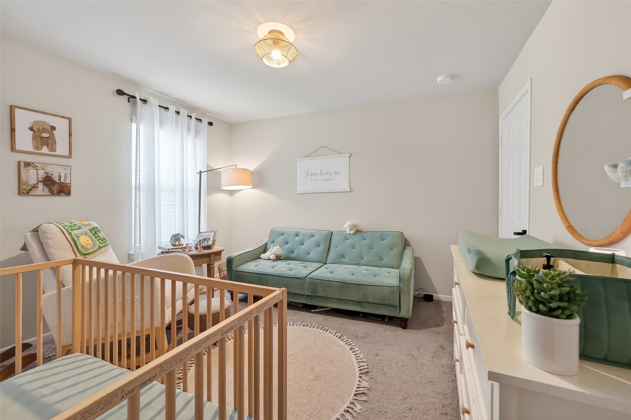 689 Red Elm Lane Conroe, TX 77304 - Photo 26 of 37 a living room with furniture and wooden floor