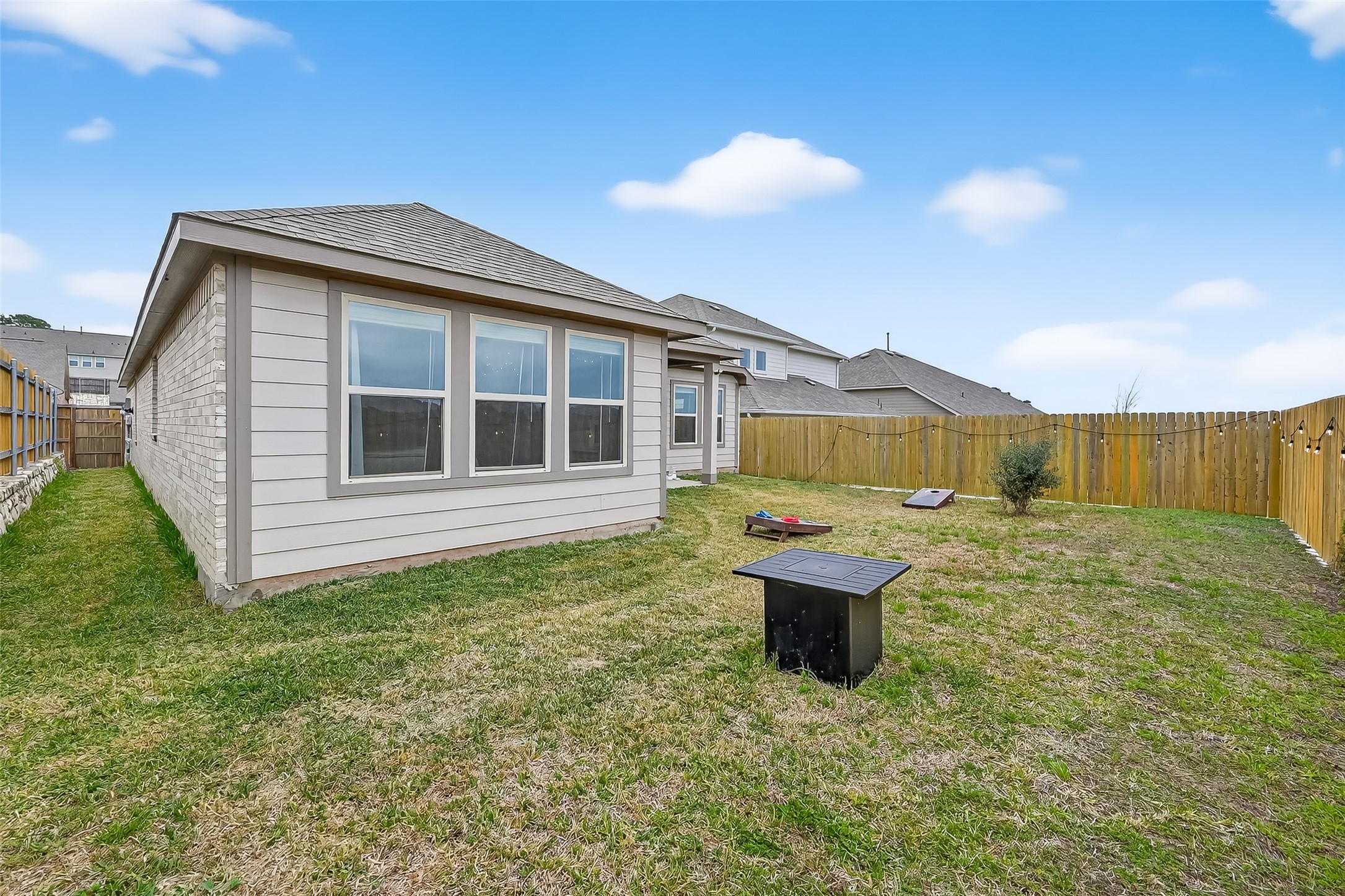 689 Red Elm Lane Conroe, TX 77304 - Photo 29 of 37 a view of a house with backyard