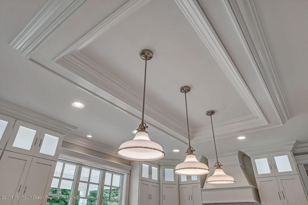 99 Rivers Edge Drive Little Silver, NJ 07739 - Photo 12 of 50 a room with lots of wooden floor and windows