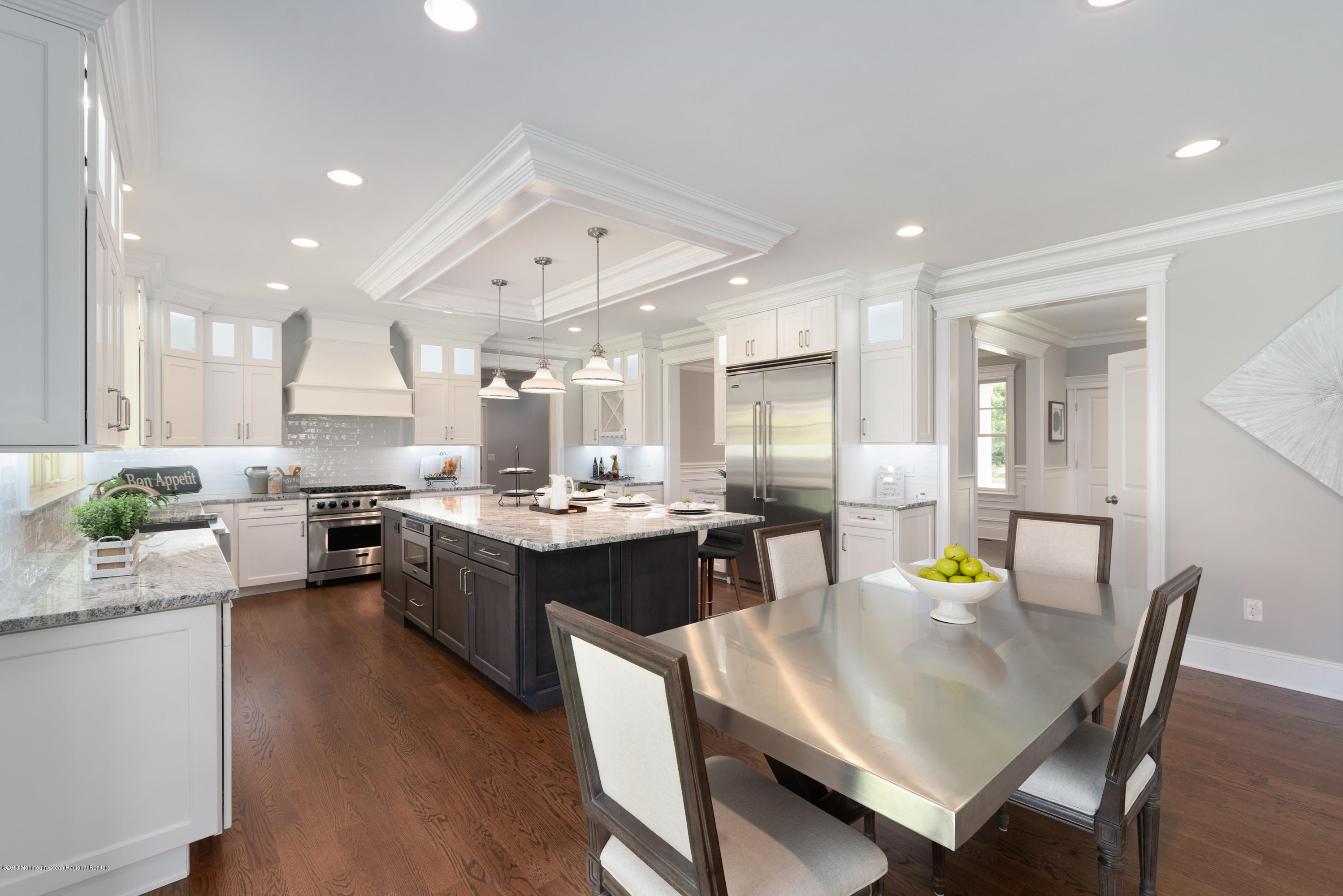 99 Rivers Edge Drive Little Silver, NJ 07739 - Photo 14 of 50 a large kitchen with a table and chairs