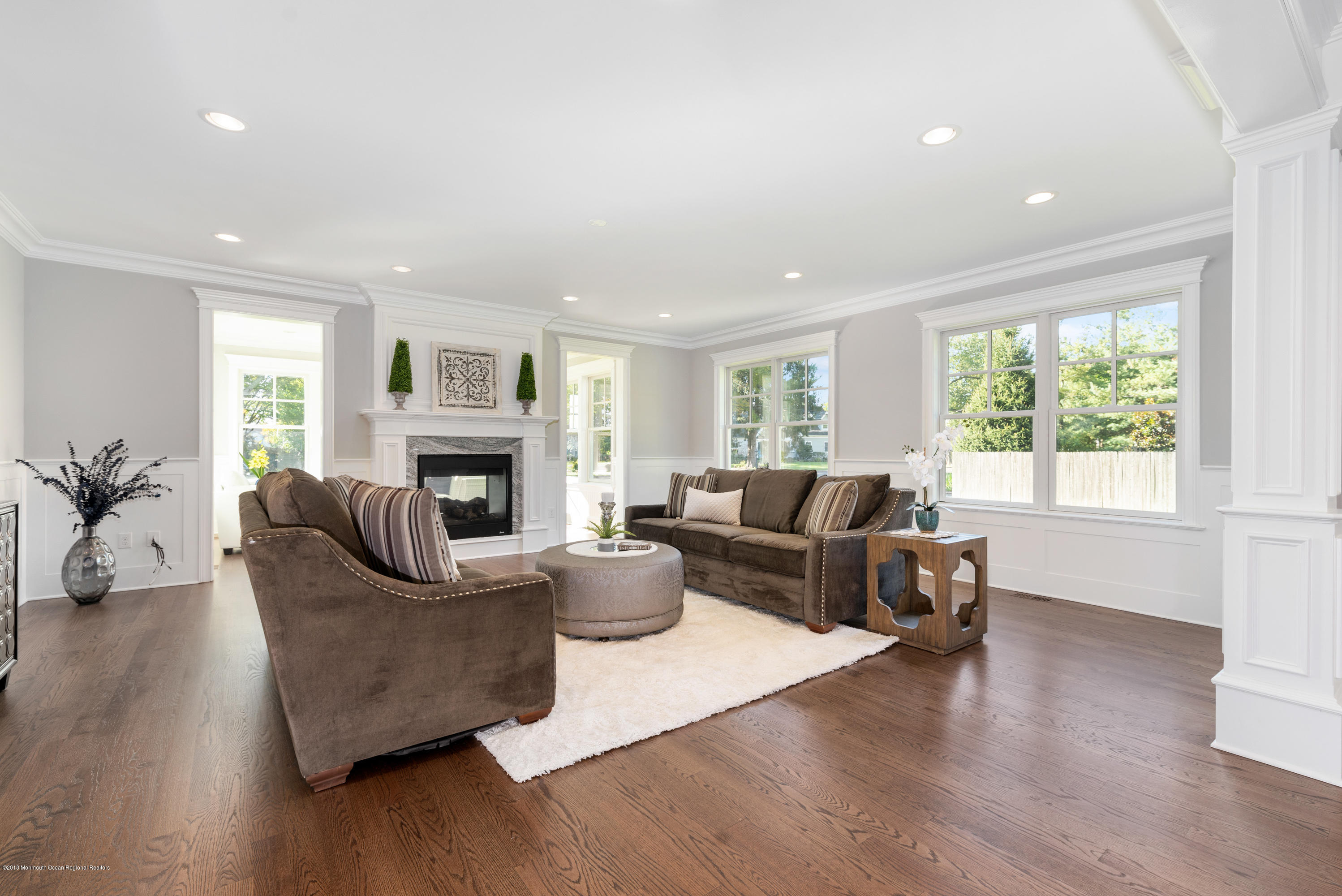 99 Rivers Edge Drive Little Silver, NJ 07739 - Photo 19 of 50 a living room with furniture and a fireplace