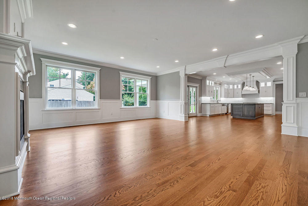 99 Rivers Edge Drive Little Silver, NJ 07739 - Photo 21 of 50 a view of kitchen and hall with wooden floor and windows