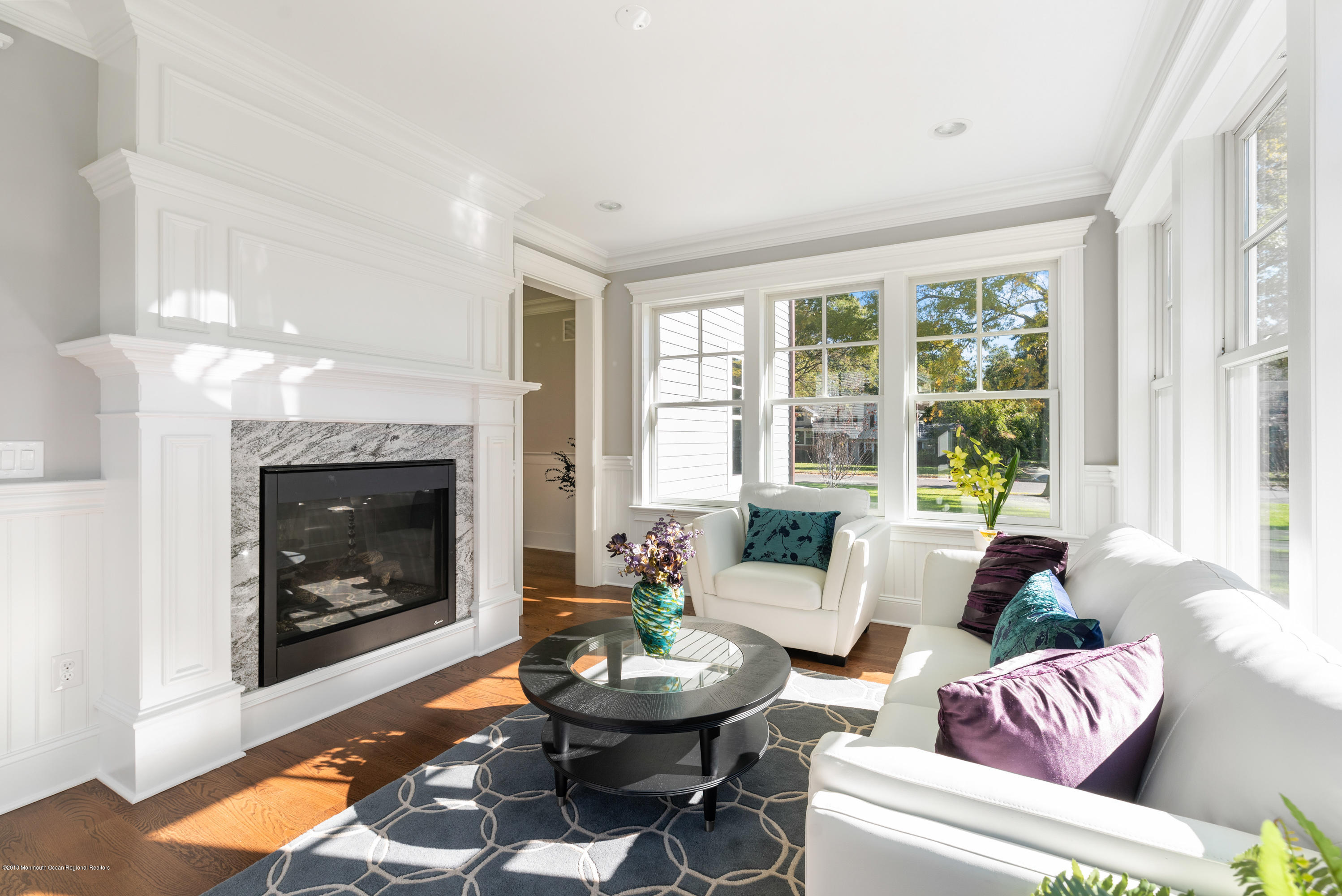 99 Rivers Edge Drive Little Silver, NJ 07739 - Photo 26 of 50 a living room with furniture and a fireplace