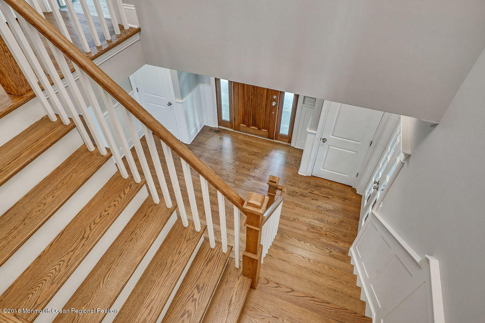 99 Rivers Edge Drive Little Silver, NJ 07739 - Photo 32 of 50 a view of entryway and hall with wooden floor