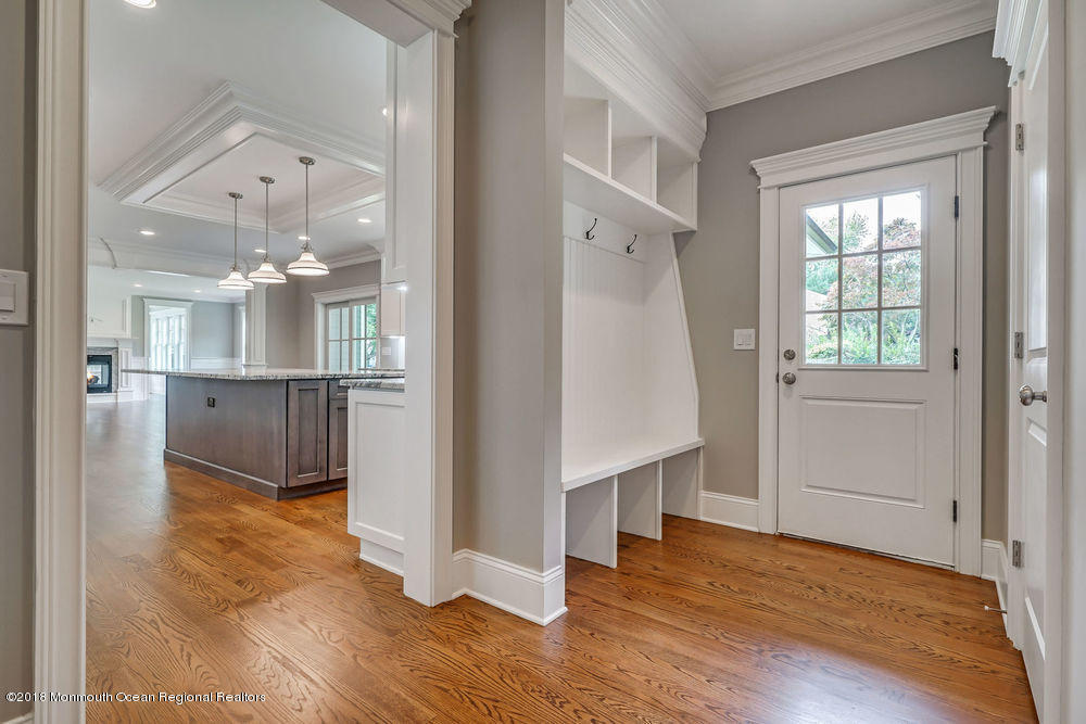 99 Rivers Edge Drive Little Silver, NJ 07739 - Photo 40 of 50 wooden floor in an empty room and a kitchen