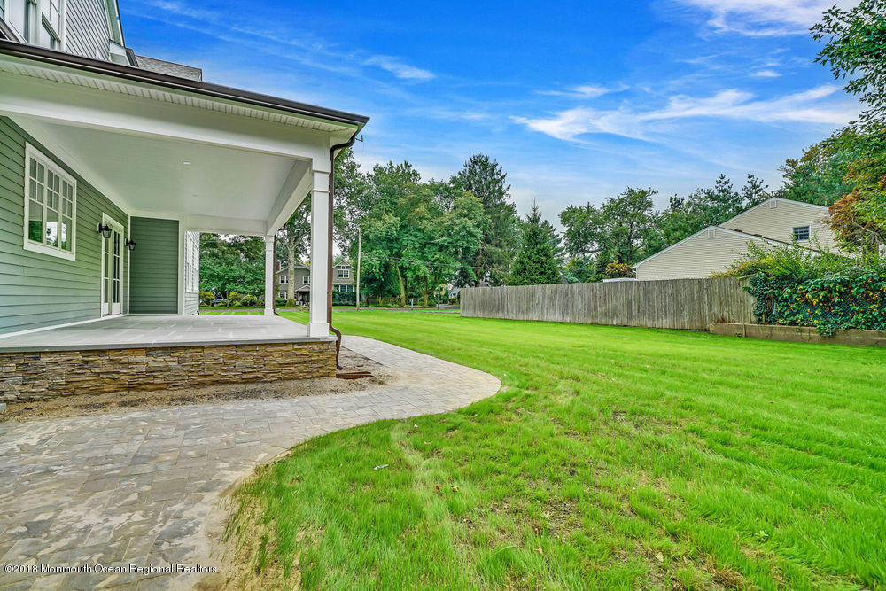 99 Rivers Edge Drive Little Silver, NJ 07739 - Photo 43 of 50 a view of house with backyard and garden