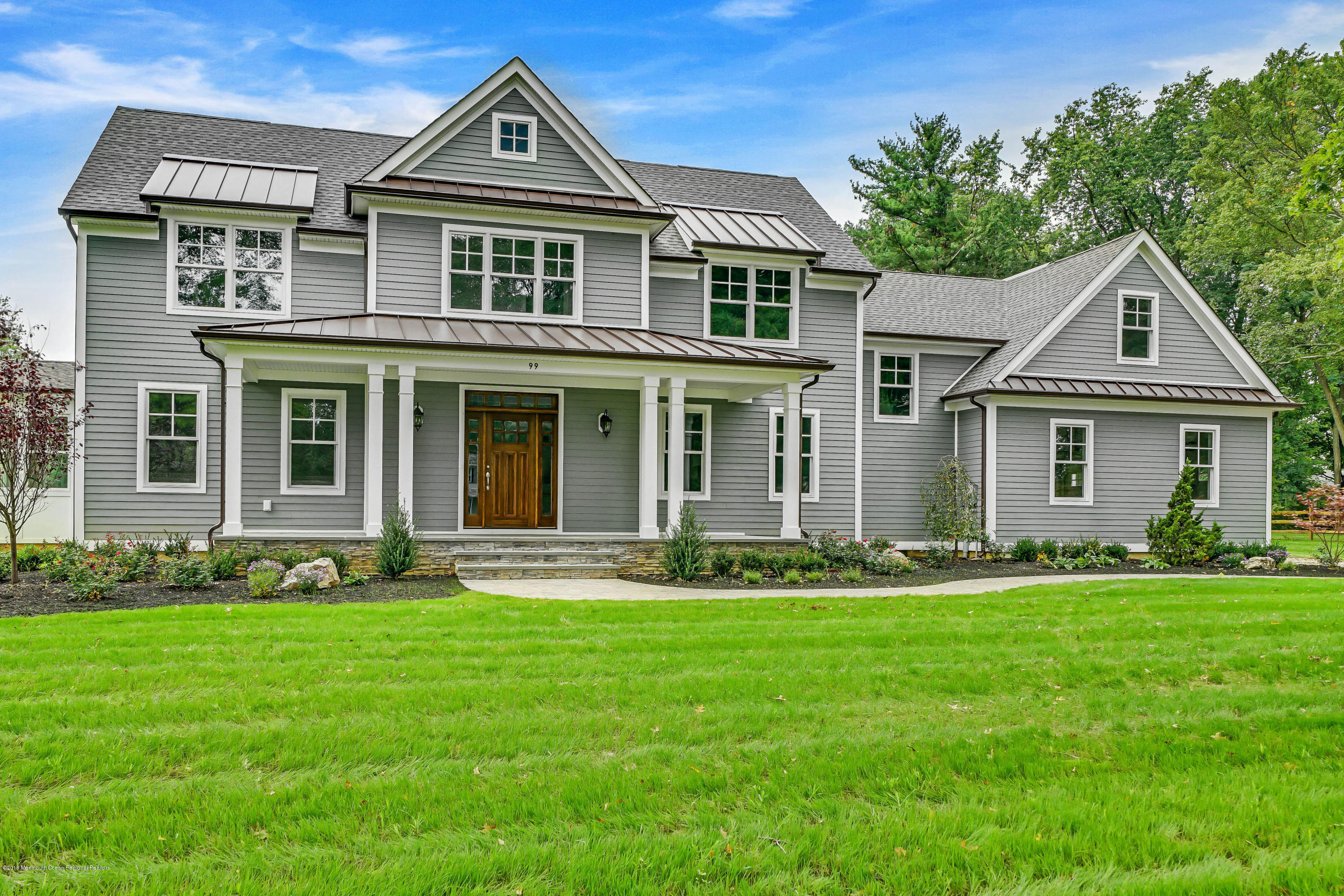 99 Rivers Edge Drive Little Silver, NJ 07739 - Photo 47 of 50 front view of a house with a yard