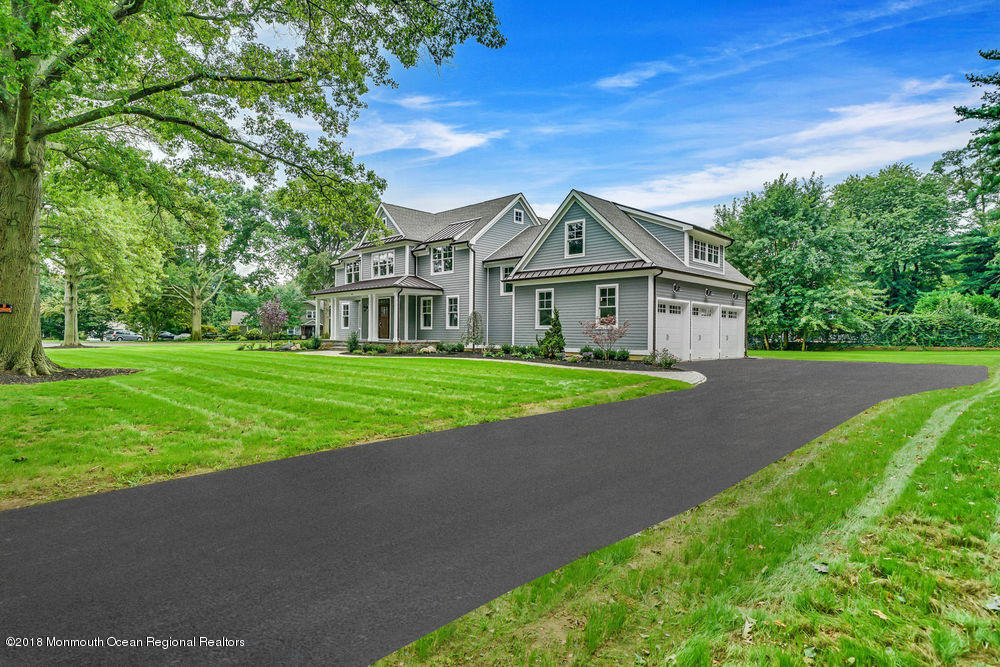 99 Rivers Edge Drive Little Silver, NJ 07739 - Photo 48 of 50 a front view of a house with yard