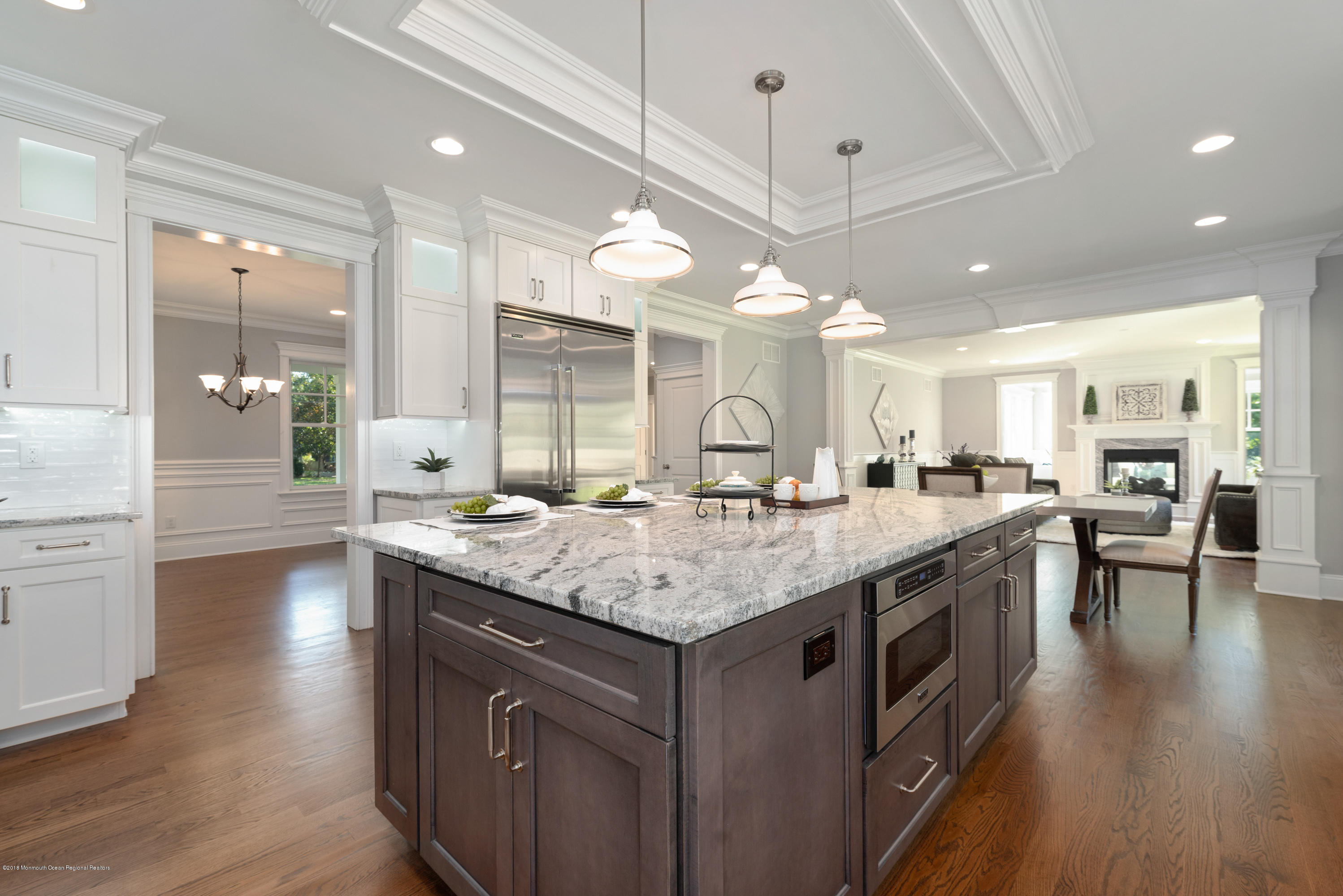 99 Rivers Edge Drive Little Silver, NJ 07739 - Photo 6 of 50 a kitchen with a counter space a sink appliances and a wooden floor